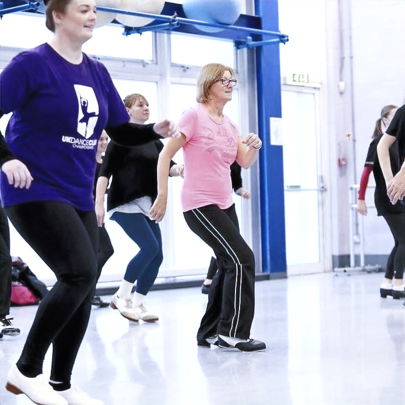 Adult students taking a dance class in the studio